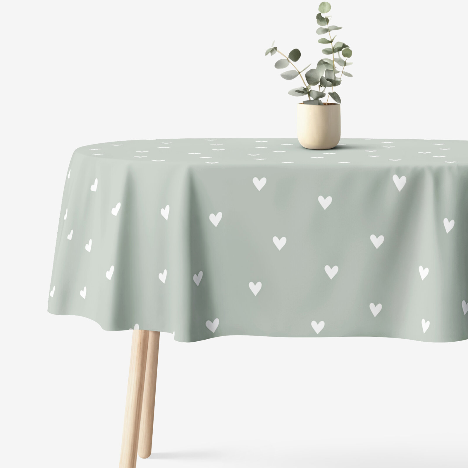 Ovale Tischdecke aus 100% Baumwolle - Herzchen auf Salbeigrün
