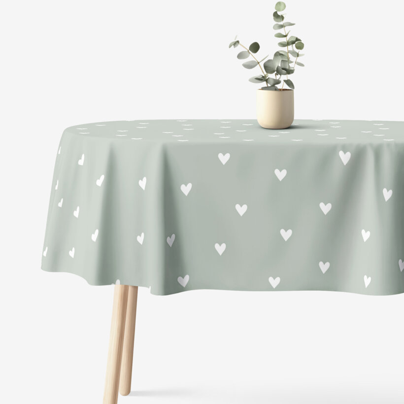 Ovale Tischdecke aus 100% Baumwolle - Herzchen auf Salbeigrün