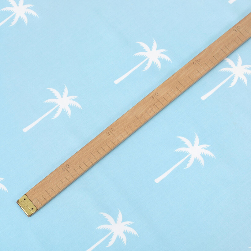 Baumwollstoff - Palmen auf Pastellblau