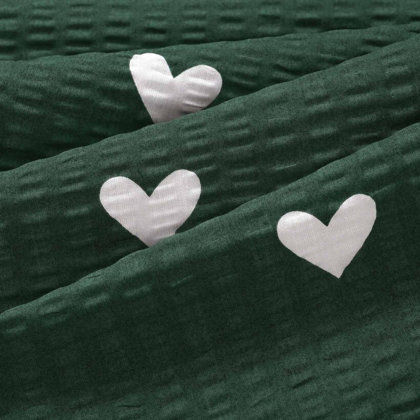 Weihnachtlicher Seersucker-Kissenbezug - Herzchen auf dunkelgrün