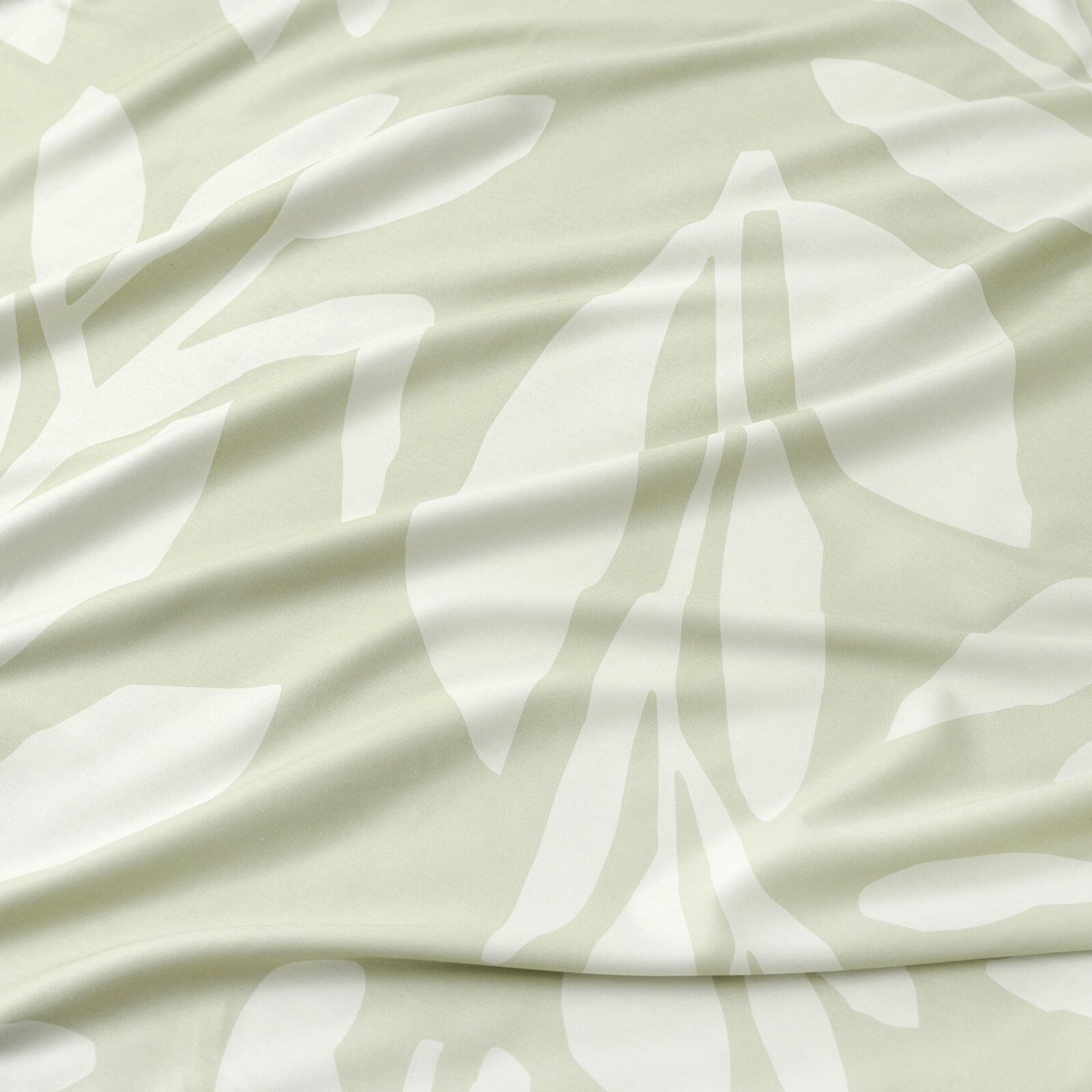 Mako-Satin - Abstrakte Blätter auf Pastellgrün