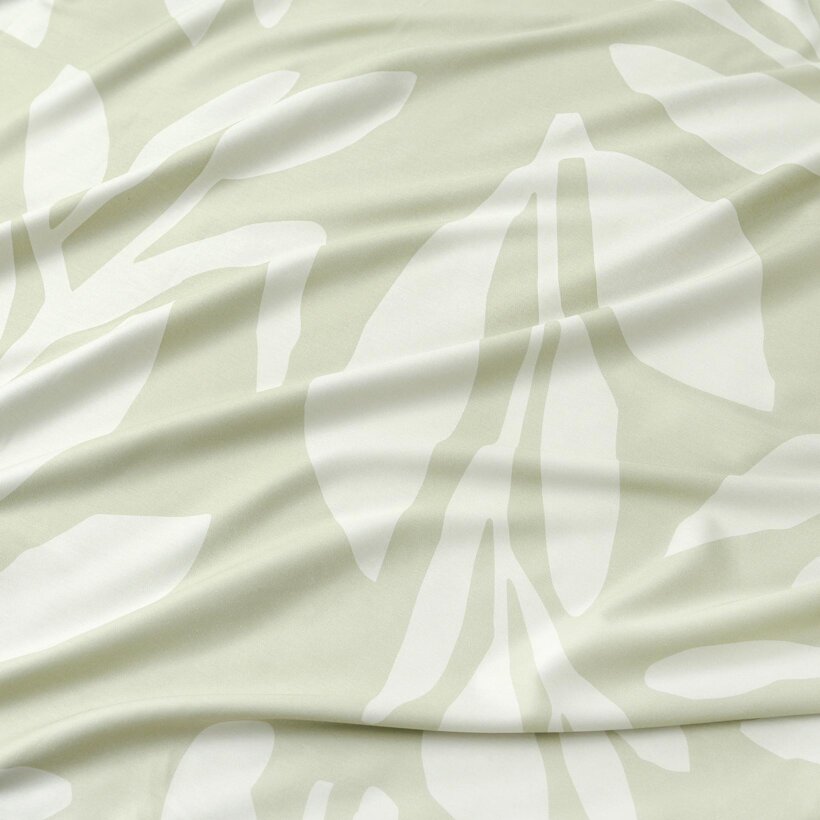 Mako-Satin - Abstrakte Blätter auf Pastellgrün