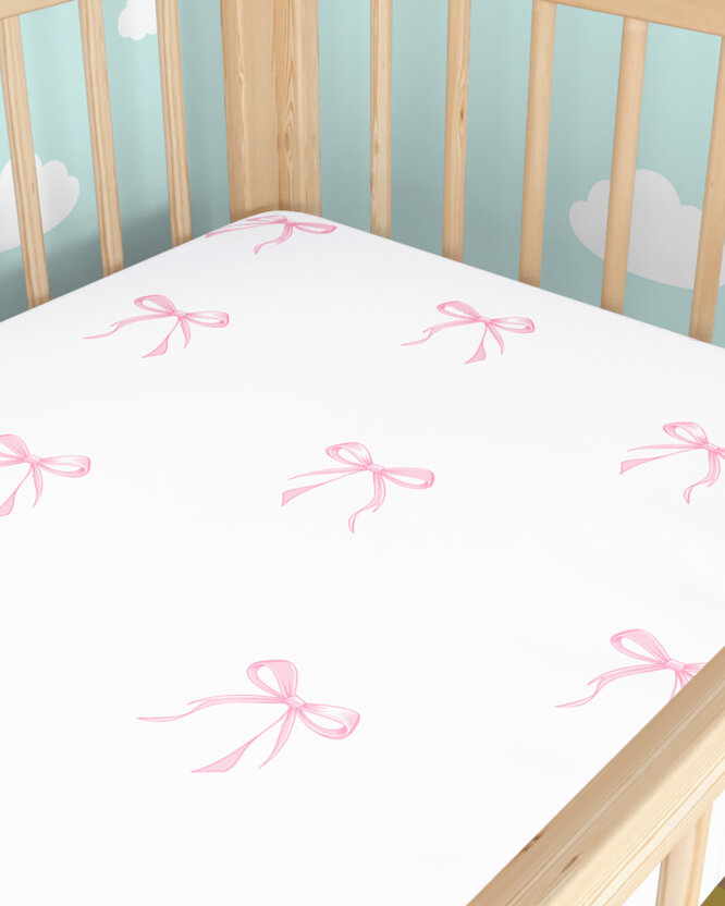 Spannbetttuch aus Baumwolle für Babybetten - rosa Schleifen