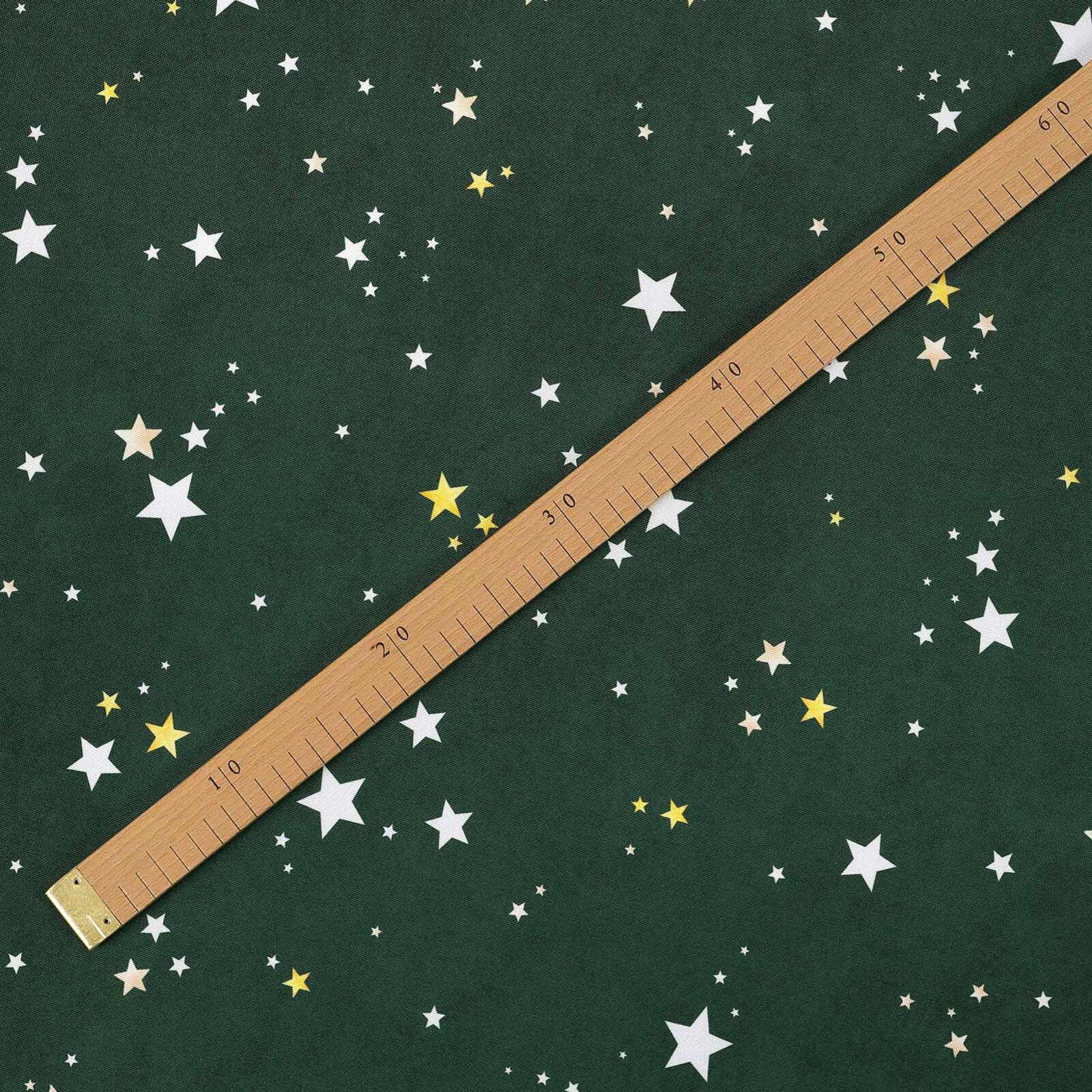 Weihnachtlicher Teflonstoff für Tischdecken – Sterne auf Grün