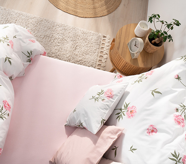 Wie wählt man das richtige Spannbettlaken für ein Doppelbett aus?
