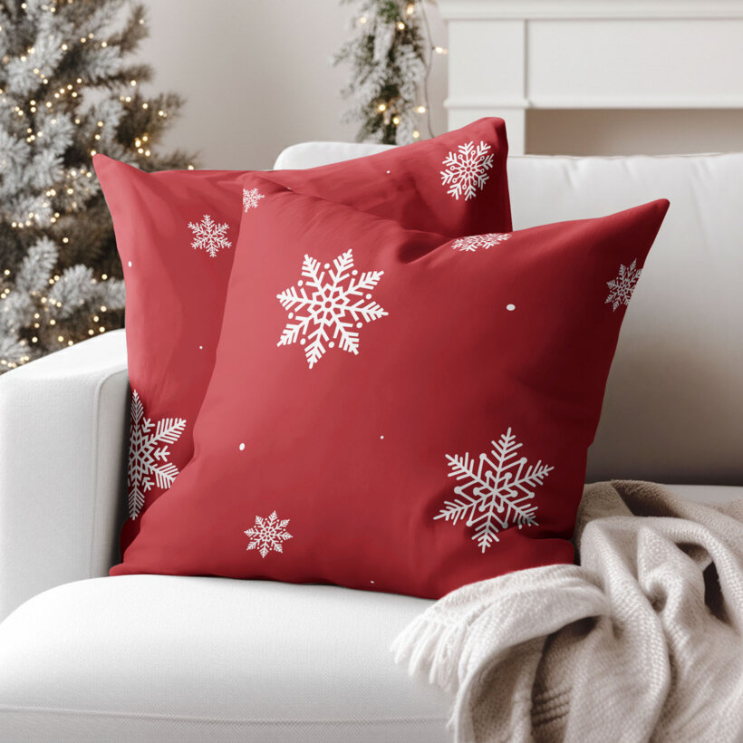 Weihnachtlicher Kissenbezug aus Baumwolle - Schneeflocken auf Rot