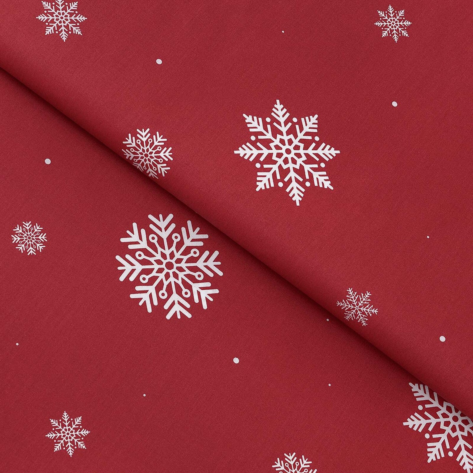 Weihnachtlicher Baumwollstoff - Schneeflocken auf Rot