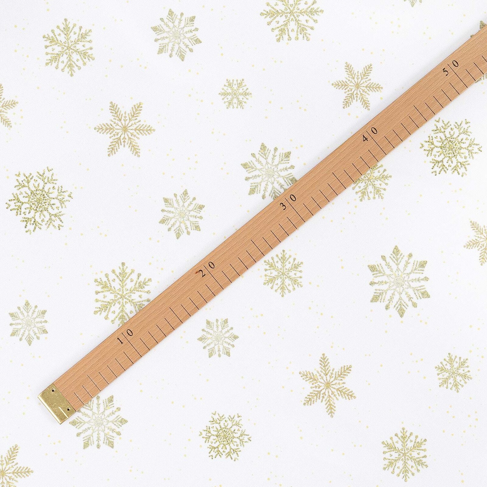 Weihnachtlicher Teflonstoff für Tischdecken – Goldene Schneeflocken