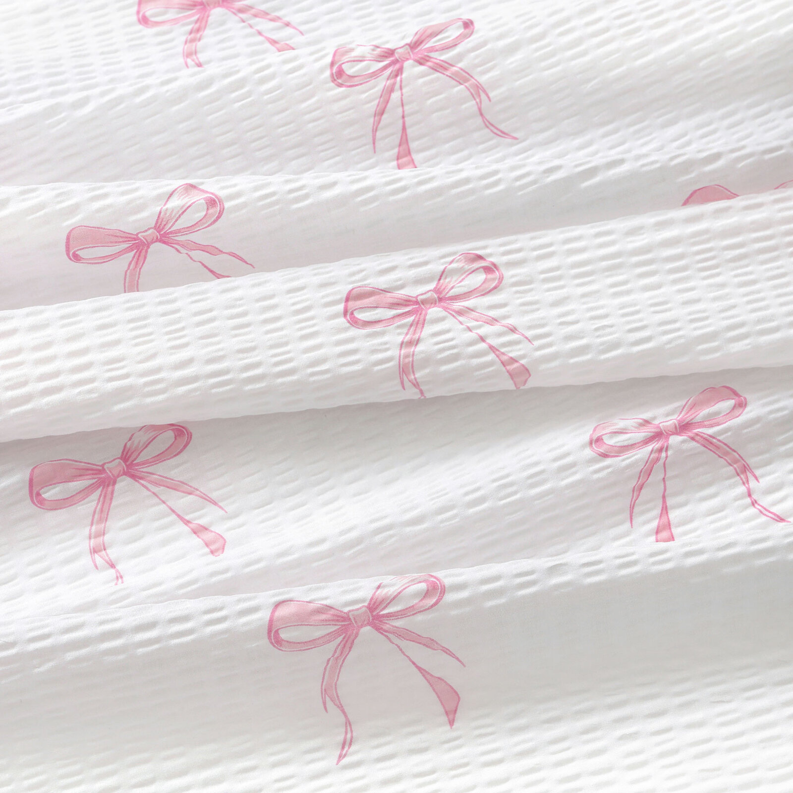Seersucker - rosa Schleifen