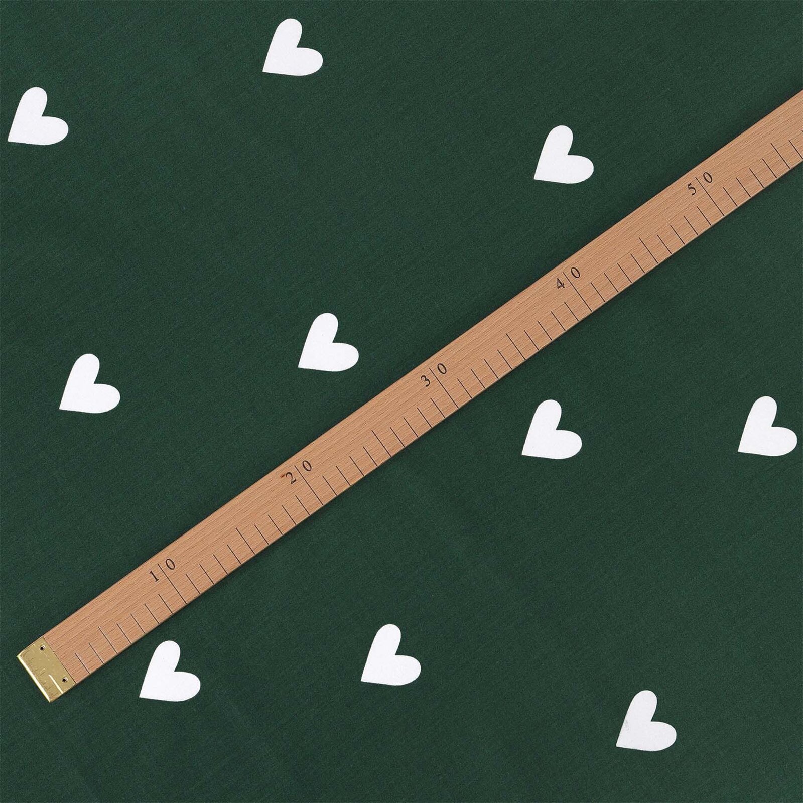 Weihnachtlicher Baumwollstoff - Herzchen auf Dunkelgrün