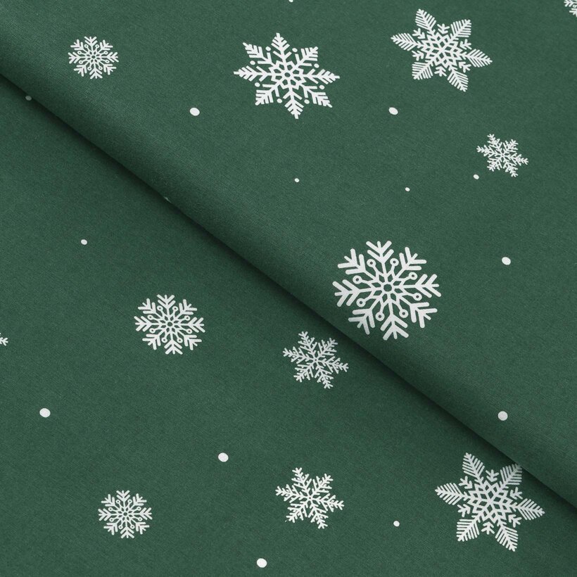 Weihnachtlicher Flanellstoff - Schneeflocken auf Grün