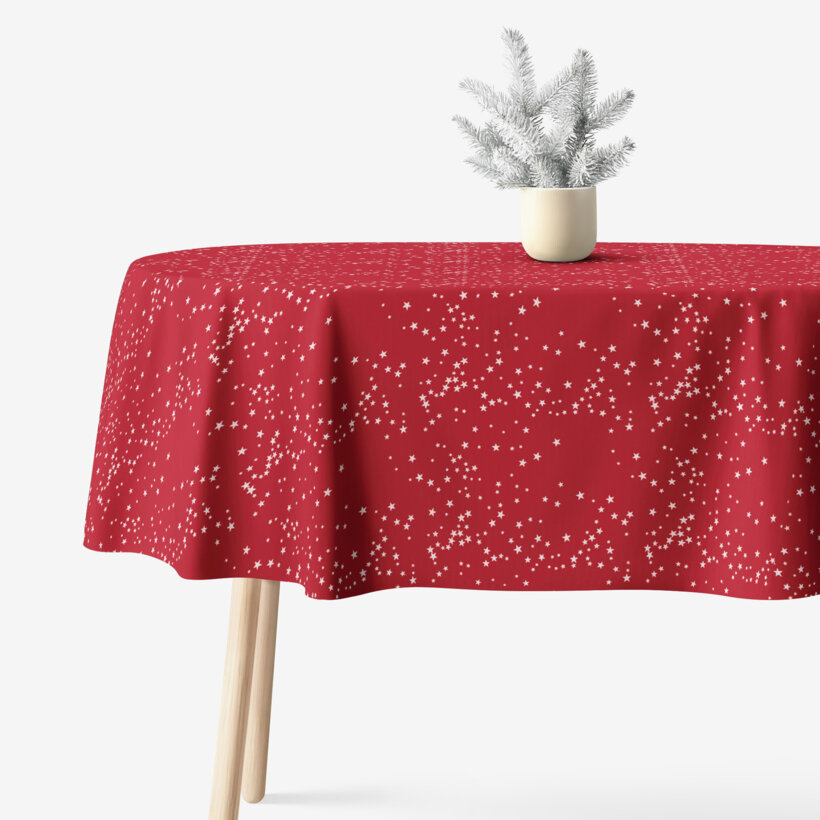 Ovale Weihnachts-Tischdecke Valencia – Sterne auf rotem Hintergrund