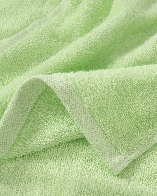 Kinder-Frottierhandtuch - Igel mit Apfel auf Grün