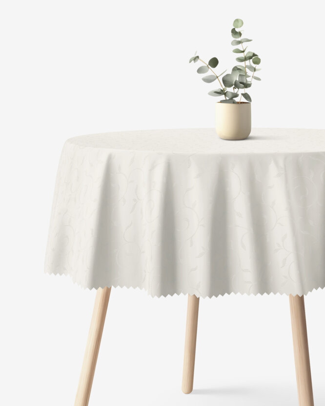Runde festliche Teflon-Tischdecke - creme mit großen Ornamenten