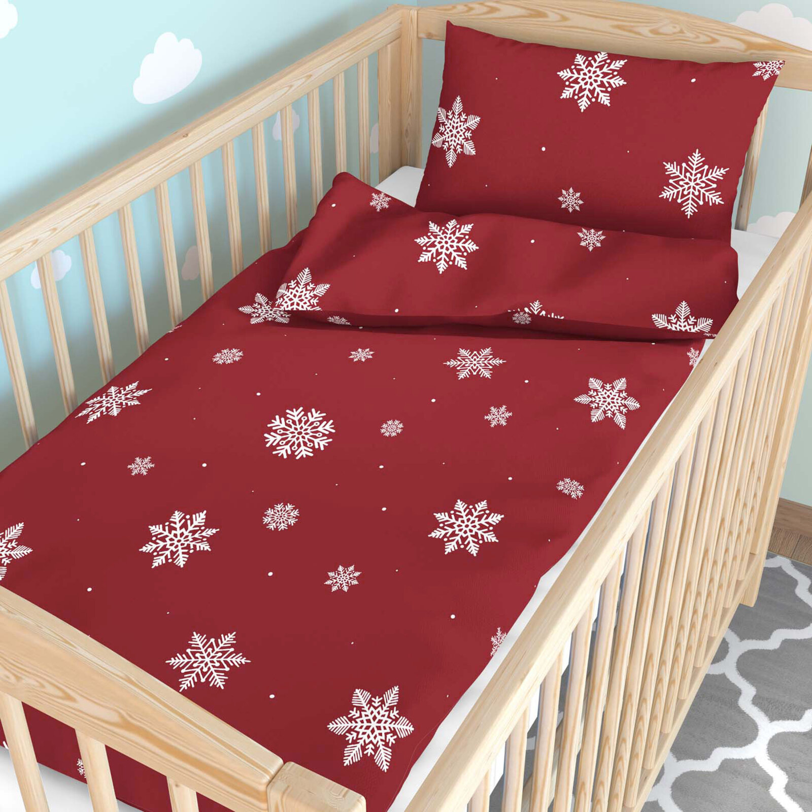 Weihnachtliche Bettwäsche für Babybetten aus Baumwolle - Schneeflocken auf Rot