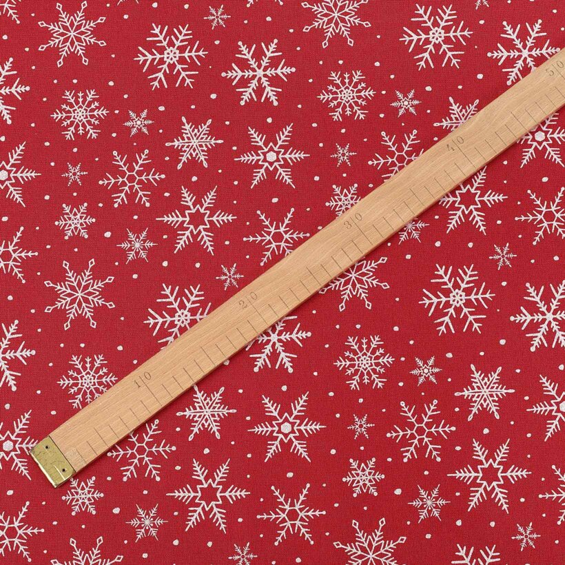 Weihnachtsstoff Valencia - Weiße Flocken auf Rot
