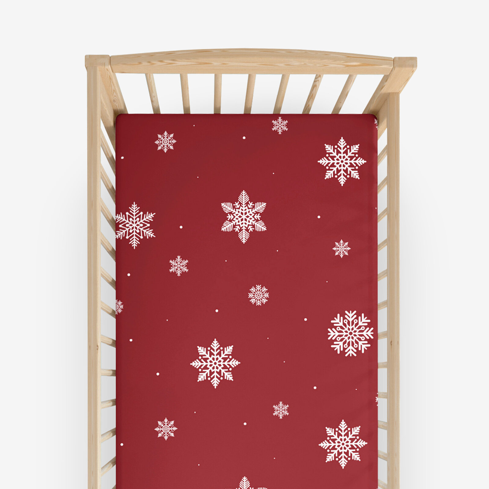 Weihnachtliches Spannbetttuch aus Baumwolle für Babybetten - Schneeflocken auf Rot