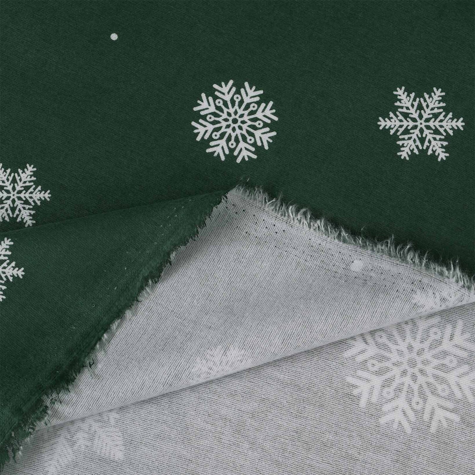 Flanellstoff - Schneeflocken auf Grün