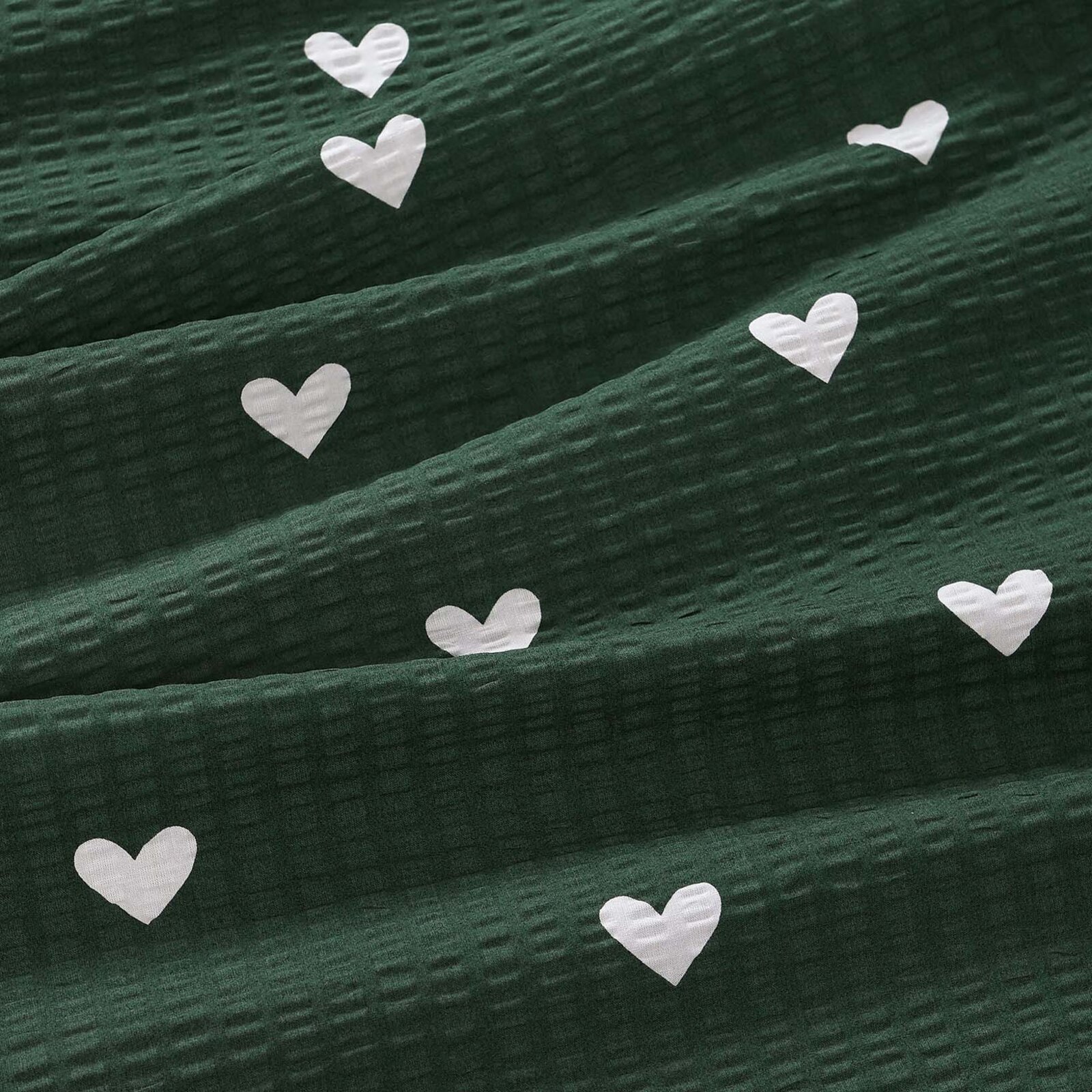 Weihnachtlicher Seersucker - Herzchen auf Dunkelgrün