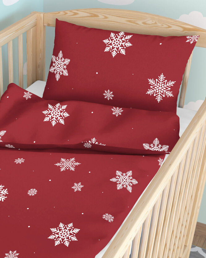 Weihnachtliche Bettwäsche für Babybetten aus Baumwolle - Schneeflocken auf Rot