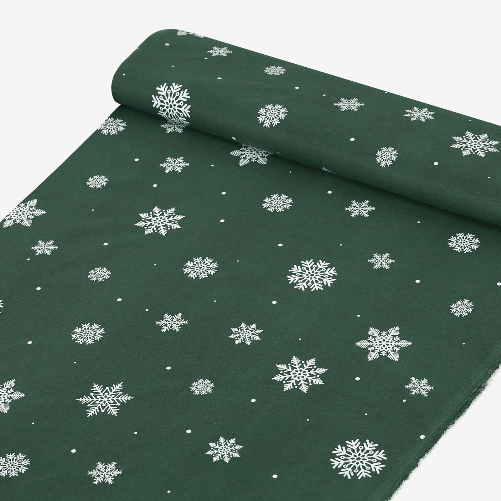 Weihnachtlicher Flanellstoff - Schneeflocken auf Grün