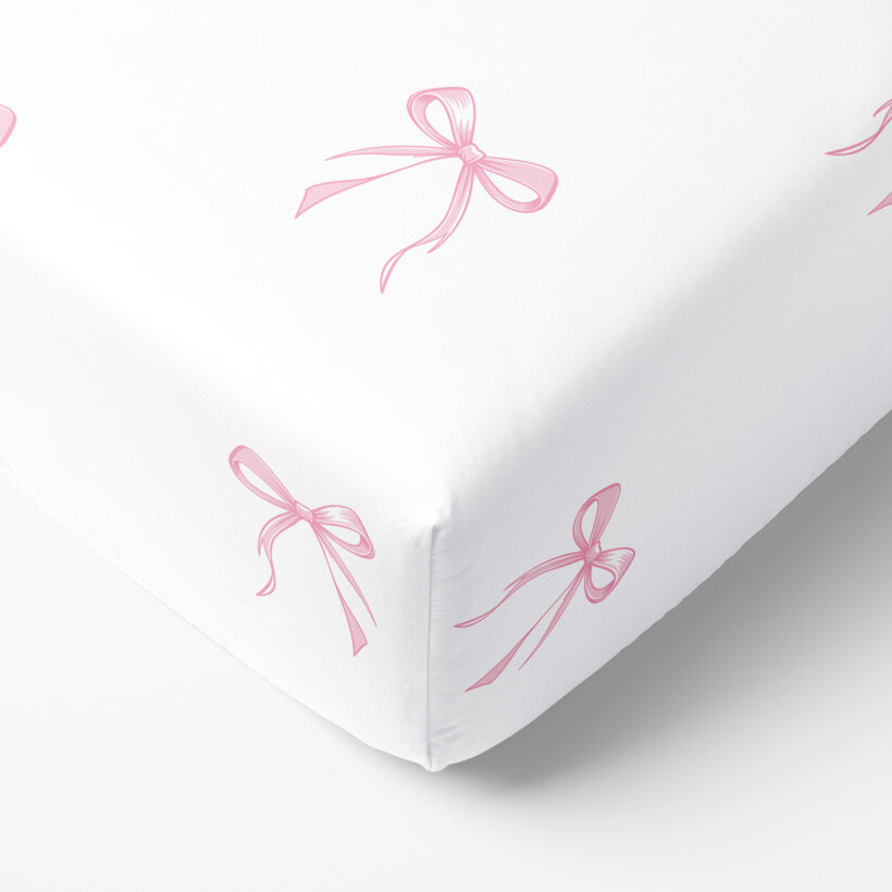 Kinder-Spannbetttuch aus Baumwolle - rosa Schleifen