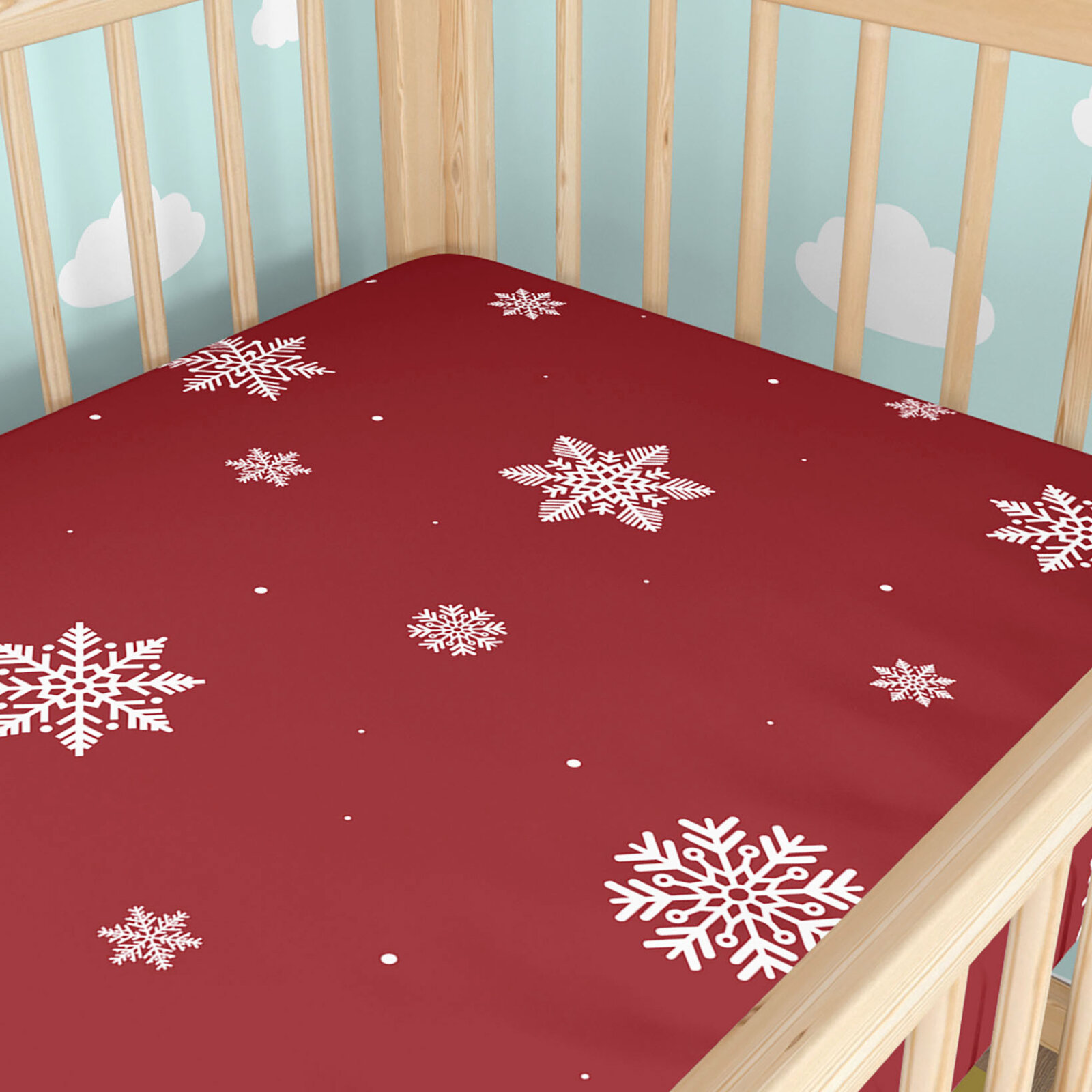 Weihnachtliches Spannbetttuch aus Baumwolle für Babybetten - Schneeflocken auf Rot