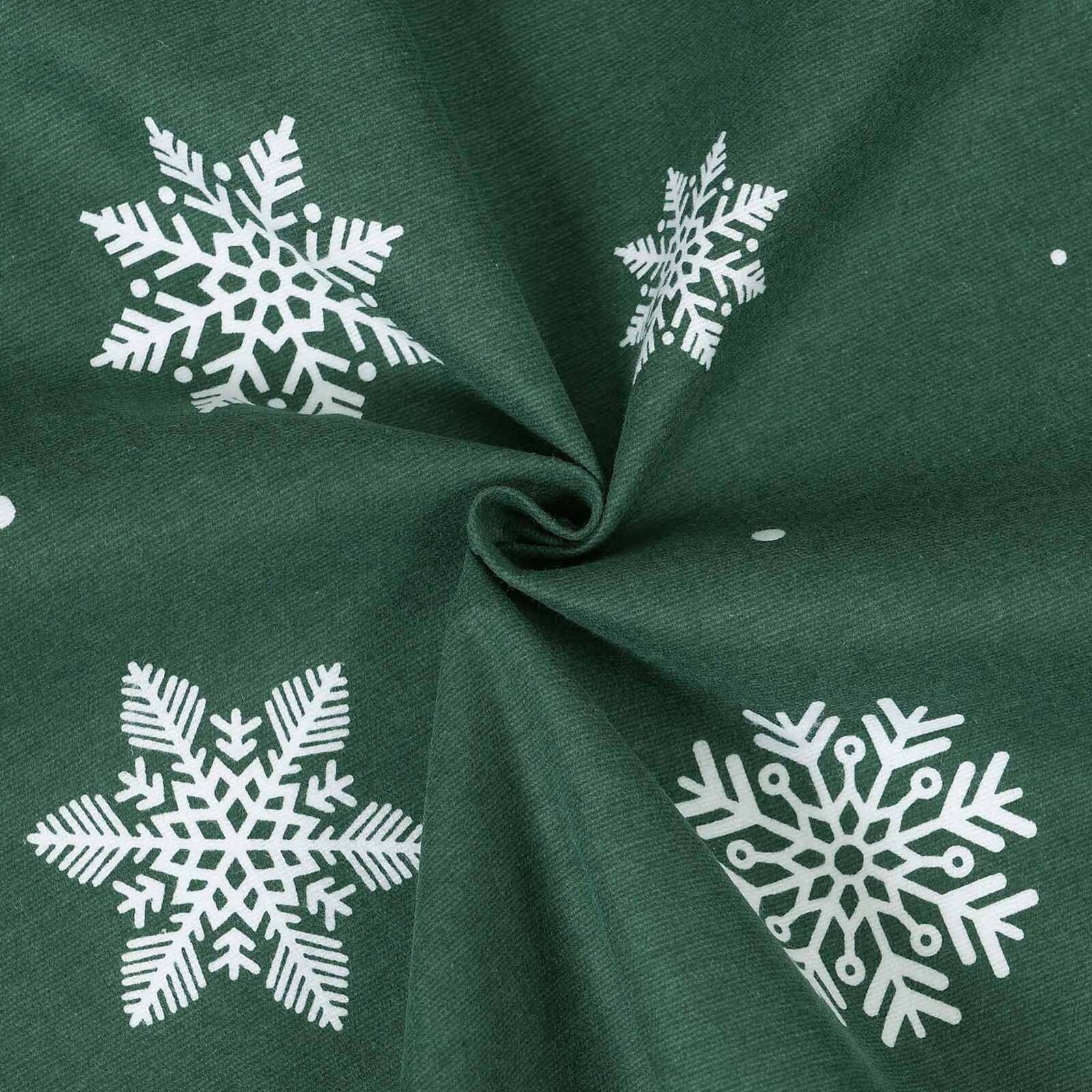Weihnachtlicher Flanellstoff - Schneeflocken auf Grün