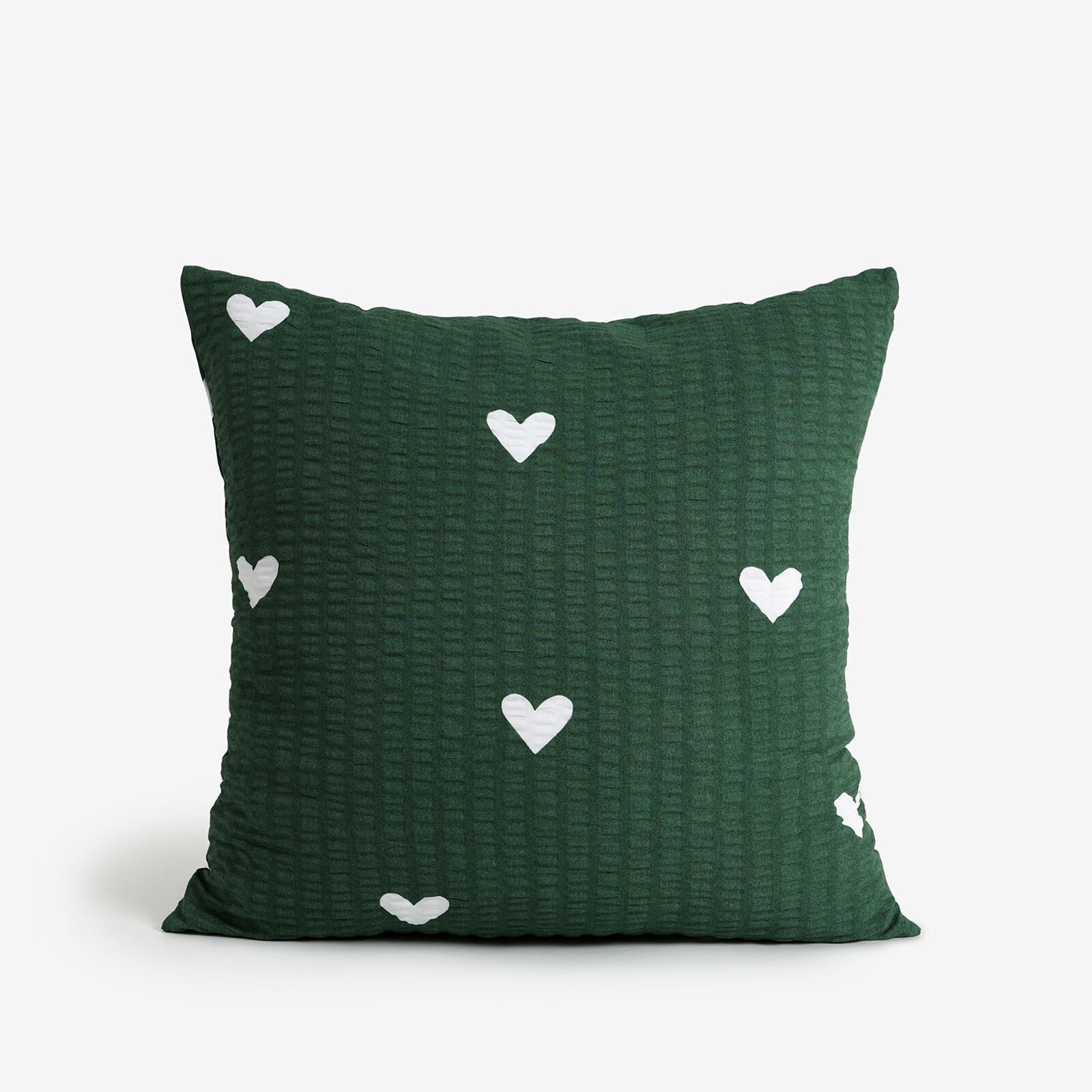 Weihnachtlicher Seersucker-Kissenbezug - Herzchen auf dunkelgrün