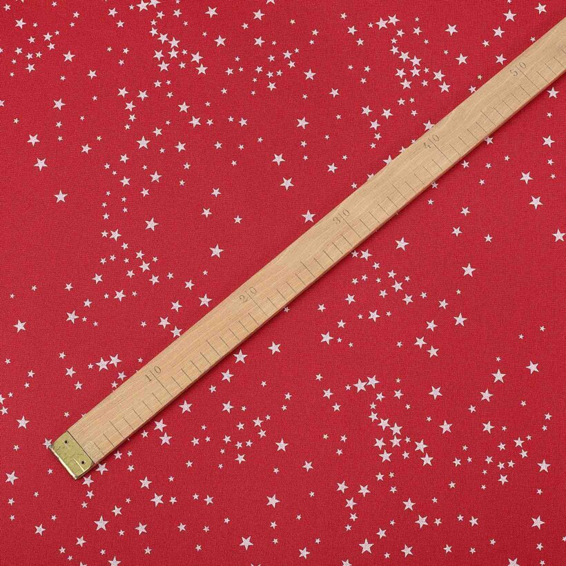 Weihnachtsstoff Valencia - Sterne auf rotem Hintergrund