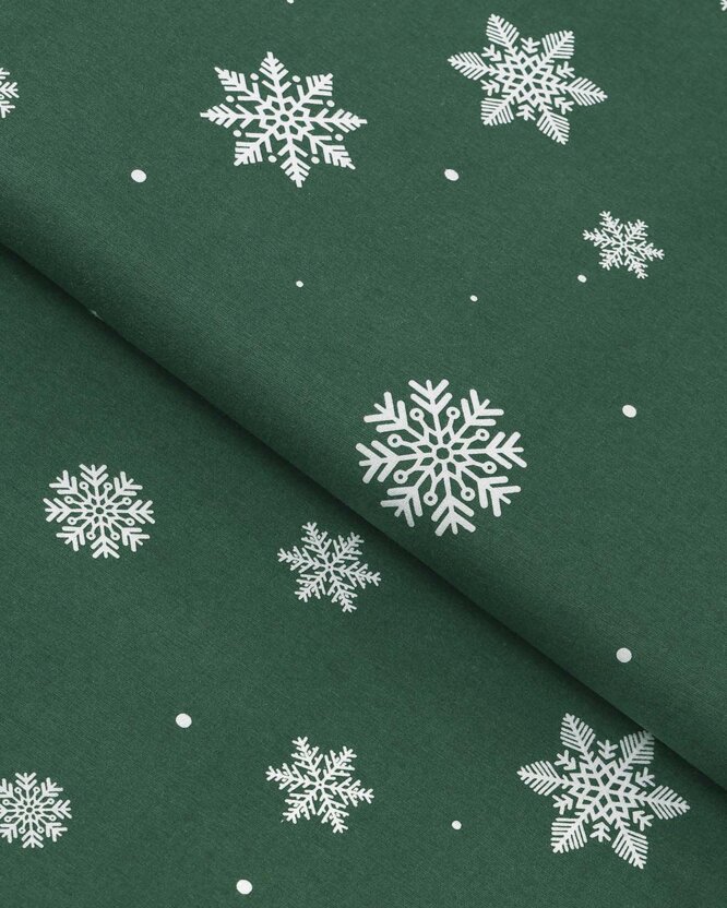 Weihnachtlicher Flanellstoff - Schneeflocken auf Grün